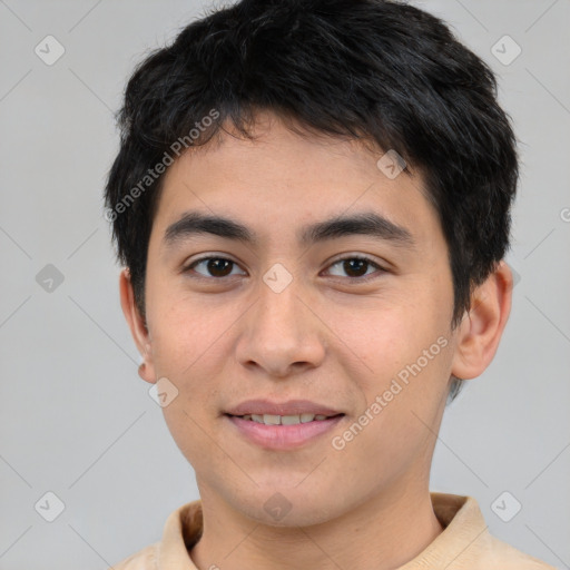 Joyful asian young-adult male with short  brown hair and brown eyes