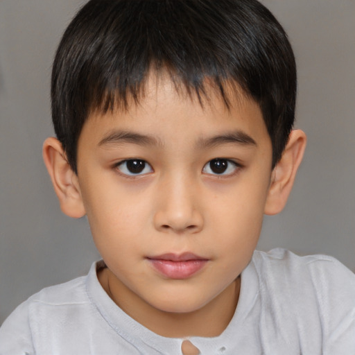 Neutral asian child male with short  brown hair and brown eyes