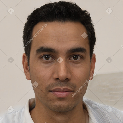 Neutral latino young-adult male with short  black hair and brown eyes