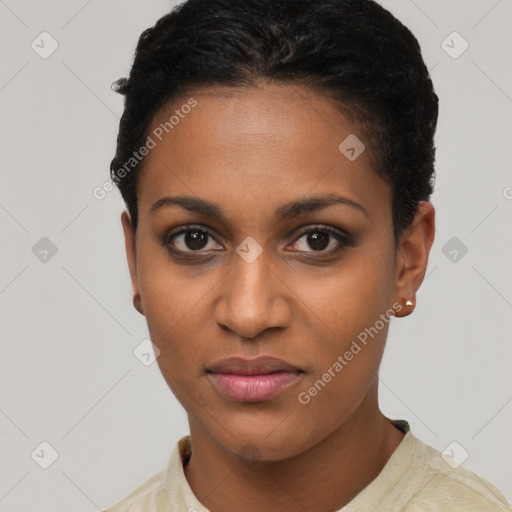 Joyful black young-adult female with short  brown hair and brown eyes