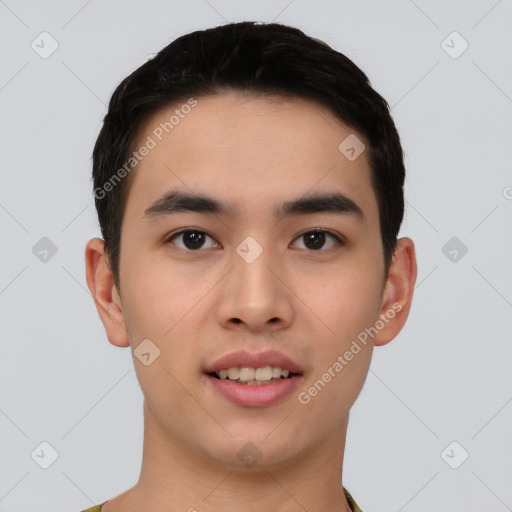 Joyful asian young-adult male with short  black hair and brown eyes