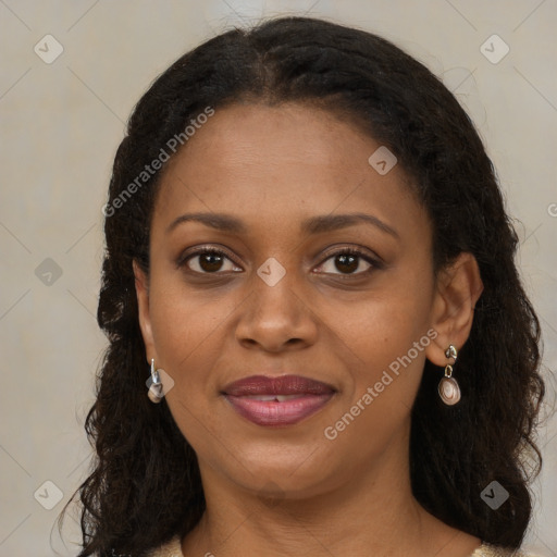 Joyful black young-adult female with medium  brown hair and brown eyes