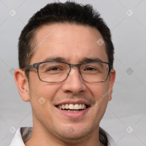 Joyful white adult male with short  brown hair and brown eyes