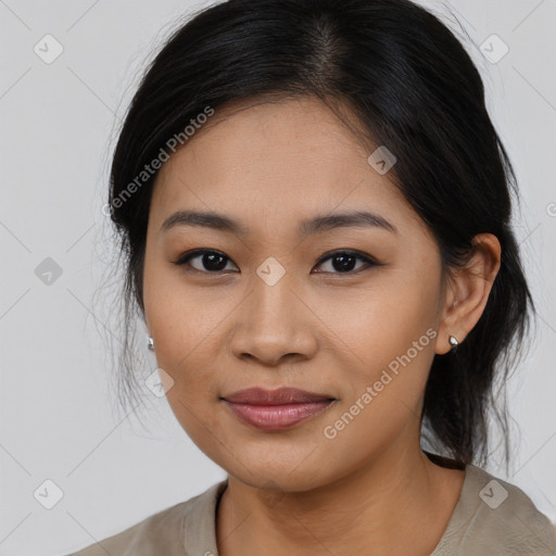 Joyful asian young-adult female with long  black hair and brown eyes