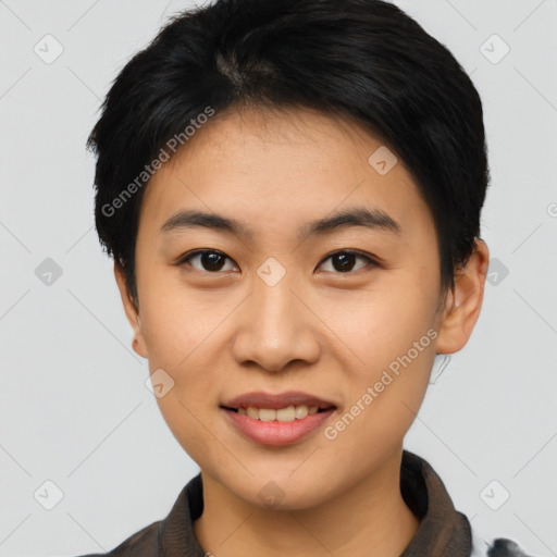 Joyful asian young-adult female with short  black hair and brown eyes