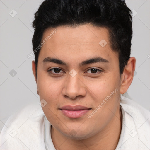 Joyful latino young-adult male with short  brown hair and brown eyes