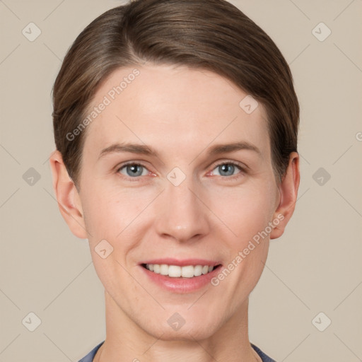 Joyful white young-adult female with short  brown hair and grey eyes