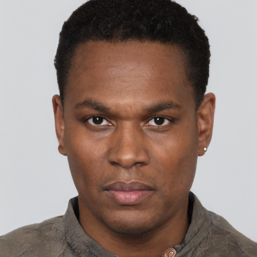 Neutral black young-adult male with short  black hair and brown eyes