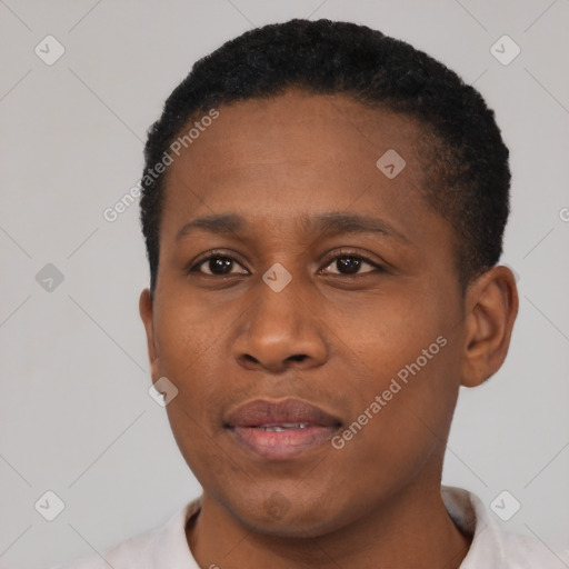 Joyful black young-adult male with short  black hair and brown eyes