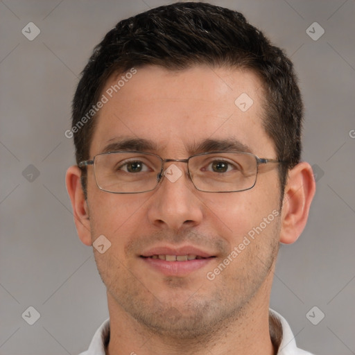 Joyful white adult male with short  brown hair and brown eyes