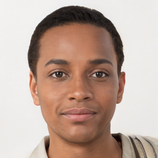 Joyful latino young-adult male with short  brown hair and brown eyes