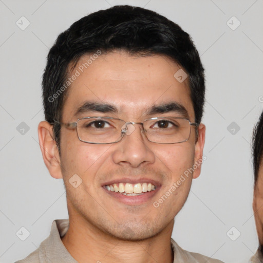 Joyful white young-adult male with short  black hair and brown eyes