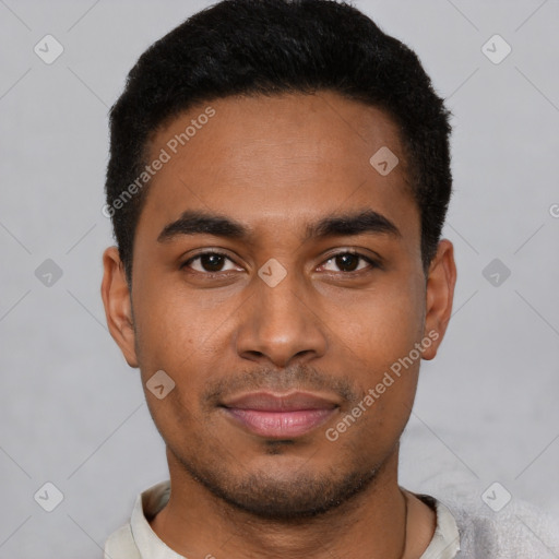 Joyful black young-adult male with short  black hair and brown eyes