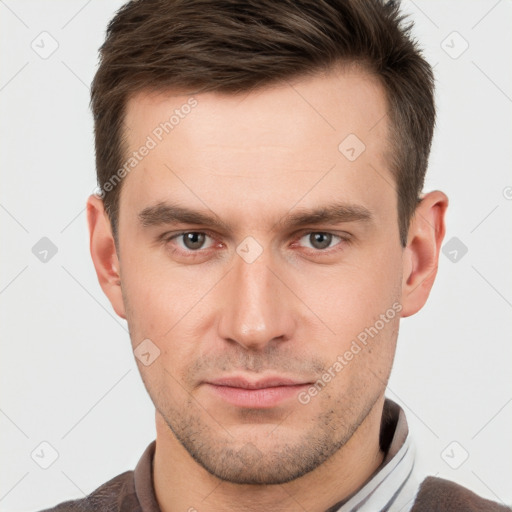 Neutral white young-adult male with short  brown hair and grey eyes