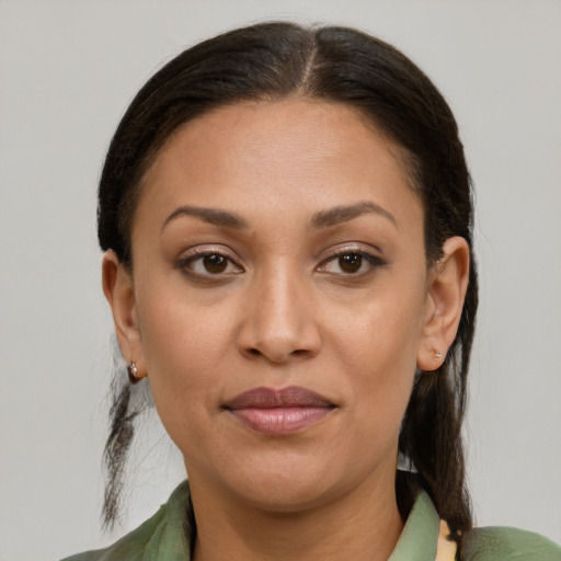 Joyful white young-adult female with medium  brown hair and brown eyes