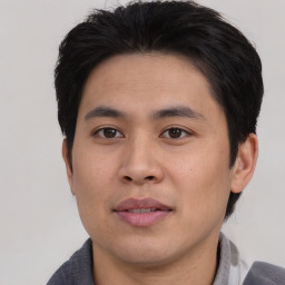 Neutral asian young-adult male with short  brown hair and brown eyes