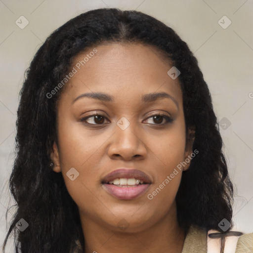 Joyful black young-adult female with long  brown hair and brown eyes