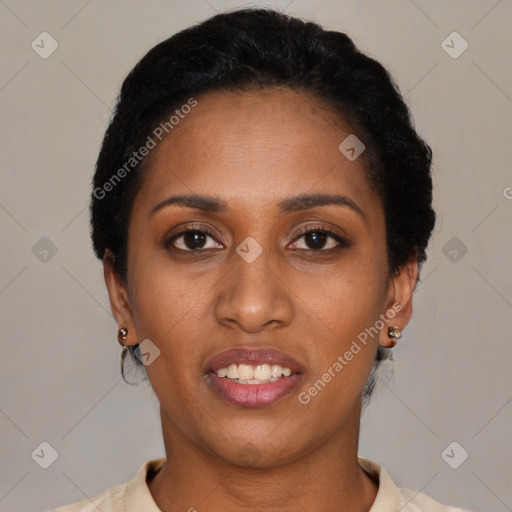Joyful black young-adult female with short  black hair and brown eyes