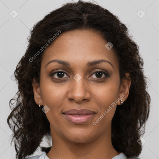 Joyful black young-adult female with medium  brown hair and brown eyes