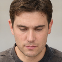 Neutral white adult male with short  brown hair and brown eyes