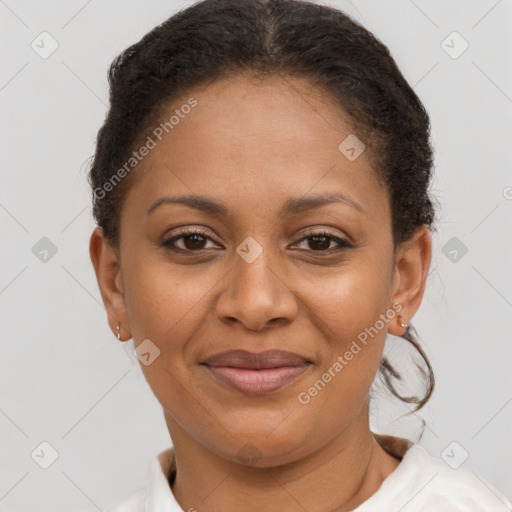 Joyful latino young-adult female with short  brown hair and brown eyes