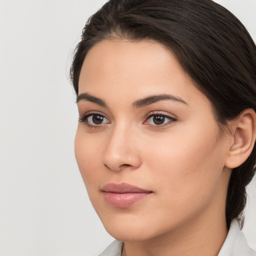 Neutral white young-adult female with medium  brown hair and brown eyes