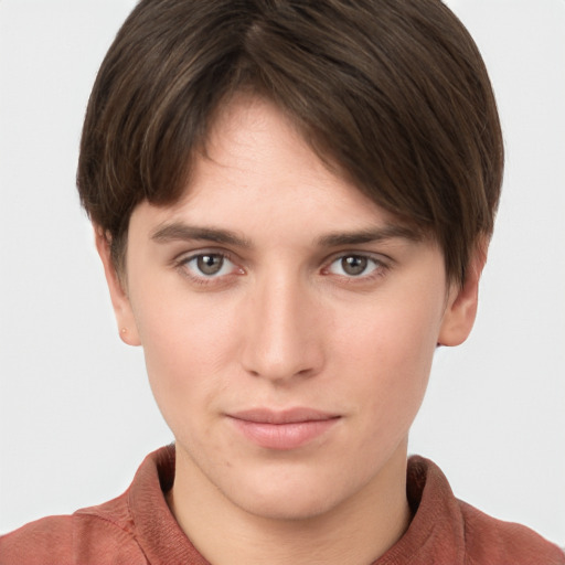 Neutral white young-adult female with short  brown hair and brown eyes