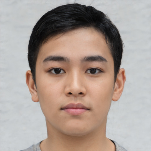 Neutral asian child male with short  black hair and brown eyes