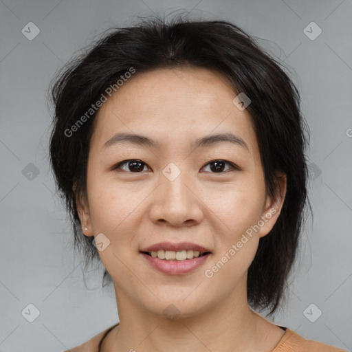 Joyful asian young-adult female with medium  brown hair and brown eyes