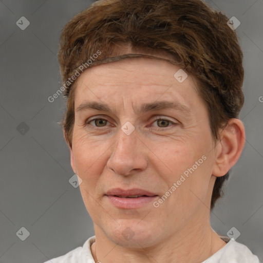 Joyful white adult female with short  brown hair and brown eyes