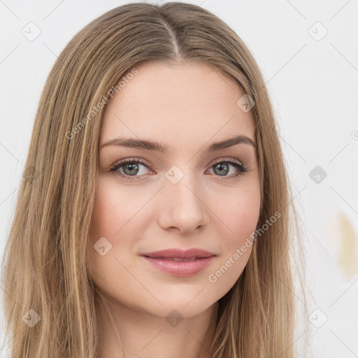 Joyful white young-adult female with long  brown hair and green eyes