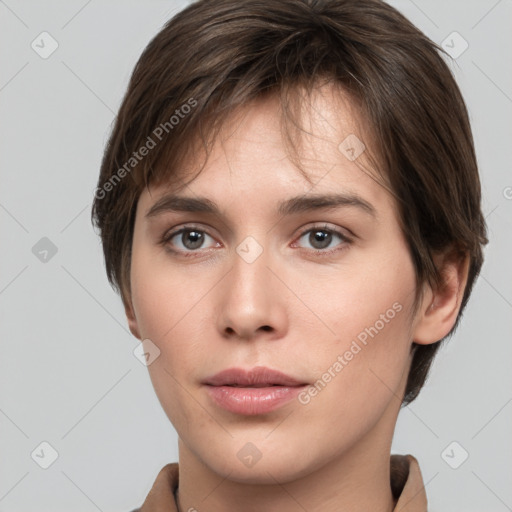 Neutral white young-adult female with short  brown hair and brown eyes