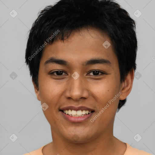 Joyful asian young-adult male with short  black hair and brown eyes