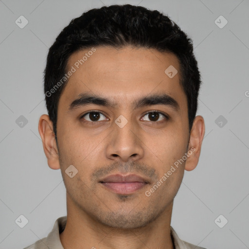 Neutral latino young-adult male with short  black hair and brown eyes