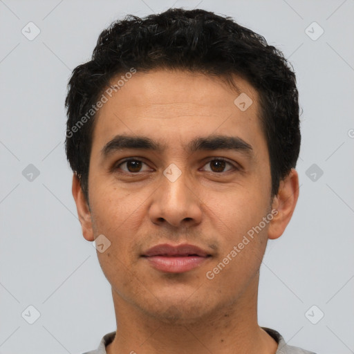 Neutral latino young-adult male with short  black hair and brown eyes