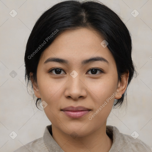 Joyful asian young-adult female with medium  black hair and brown eyes