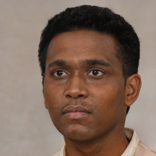Neutral black young-adult male with short  black hair and brown eyes