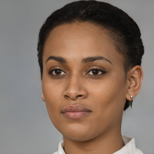 Neutral black young-adult female with short  brown hair and brown eyes