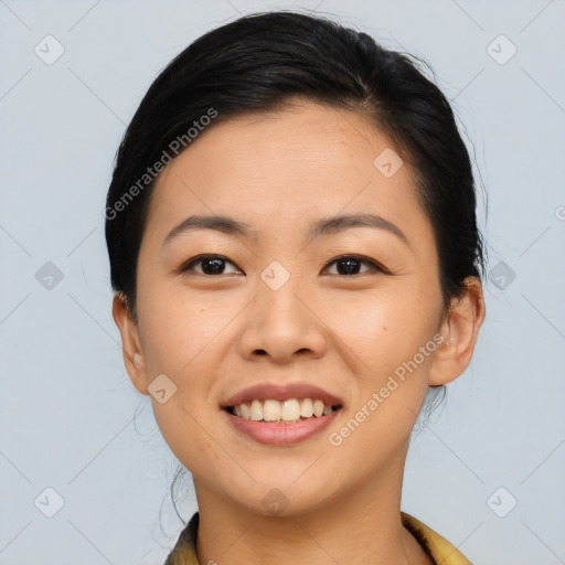 Joyful asian young-adult female with short  brown hair and brown eyes