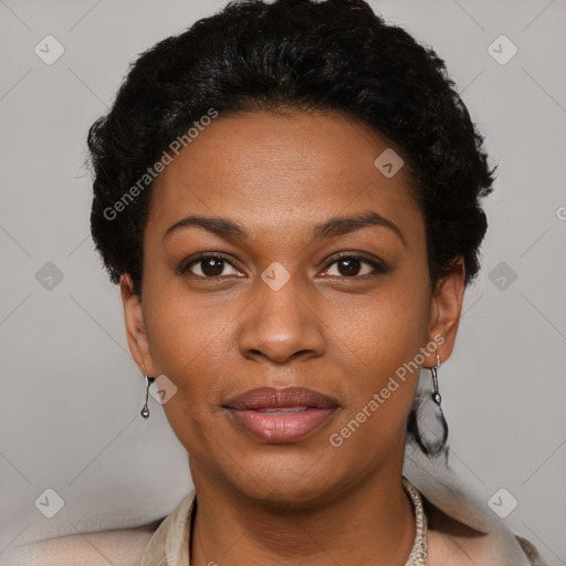 Joyful black young-adult female with short  black hair and brown eyes