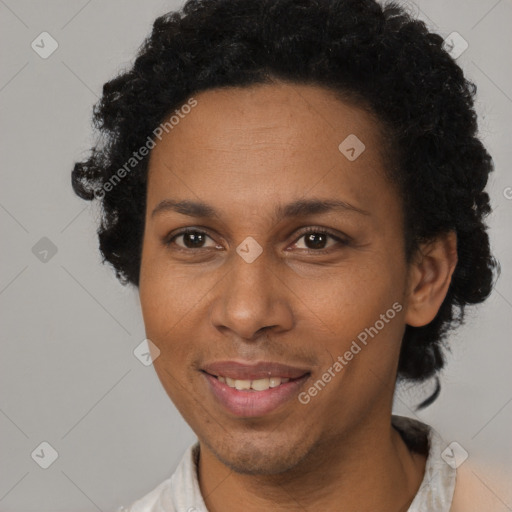 Joyful black adult female with short  brown hair and brown eyes