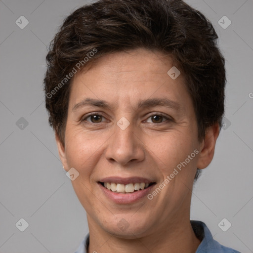 Joyful white adult female with short  brown hair and brown eyes