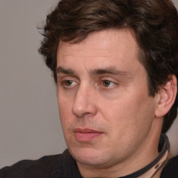 Neutral white adult male with short  brown hair and brown eyes