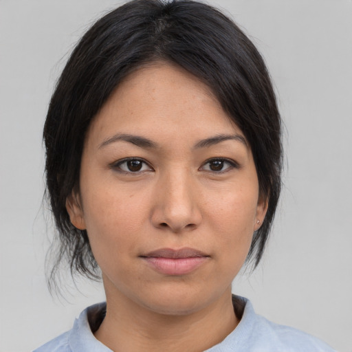 Neutral asian young-adult female with medium  black hair and brown eyes