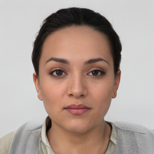 Neutral white young-adult female with short  brown hair and brown eyes
