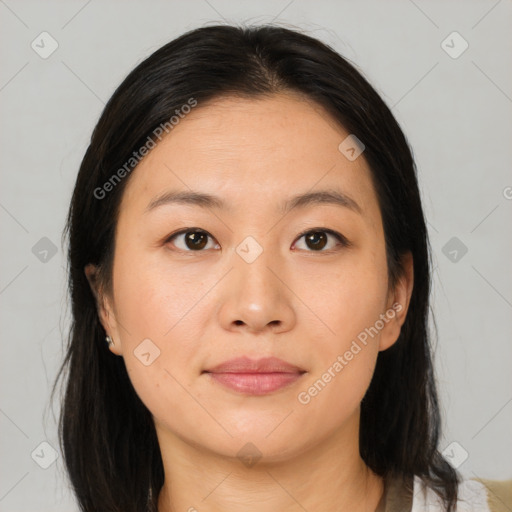 Joyful asian young-adult female with medium  brown hair and brown eyes