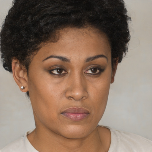 Neutral black young-adult female with short  brown hair and brown eyes