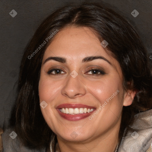 Joyful white adult female with medium  brown hair and brown eyes