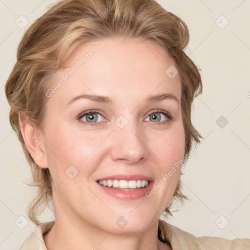 Joyful white young-adult female with medium  brown hair and blue eyes