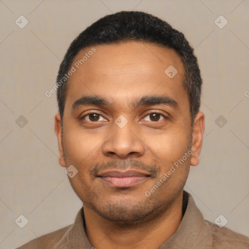 Joyful latino young-adult male with short  black hair and brown eyes